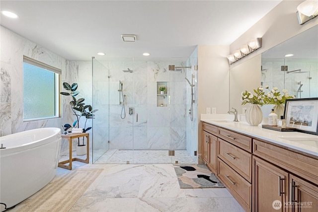 15101 91st Pl NE, Bothell, WA 98011 - full bathroom with a freestanding bath, a marble finish shower, double vanity, marble finish flooring, and recessed lighting