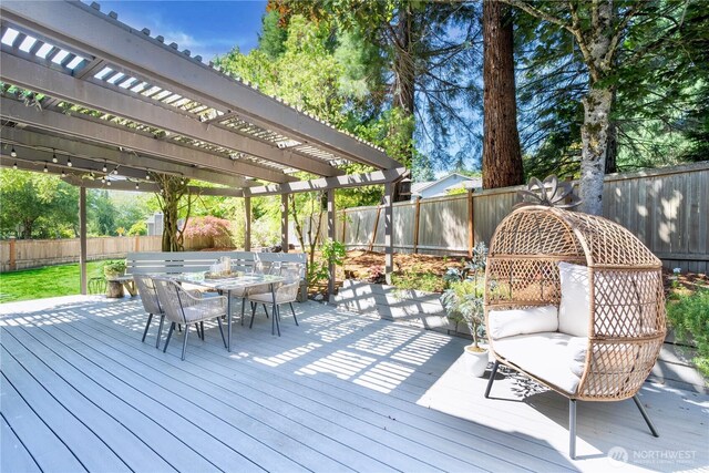 15101 91st Pl NE, Bothell, WA 98011 - wooden deck featuring outdoor dining area, a pergola, and a fenced backyard