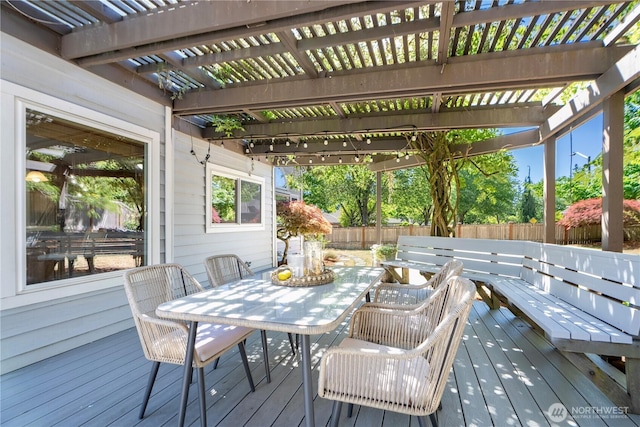 15101 91st Pl NE, Bothell, WA 98011 - wooden terrace featuring outdoor dining space, a fenced backyard, and a pergola