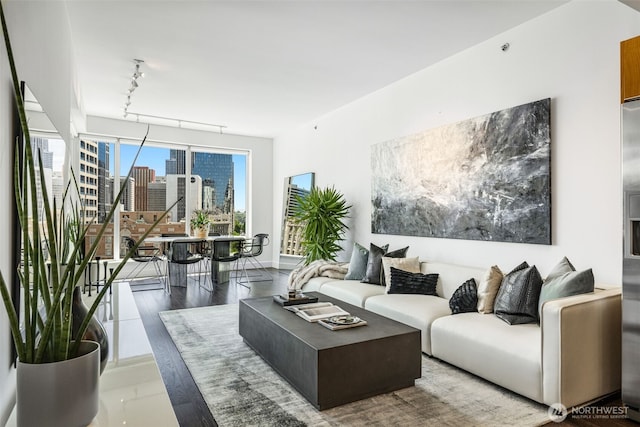 1920 4th Ave Unit 1207, Seattle, WA 98101 - living area with a view of city and rail lighting