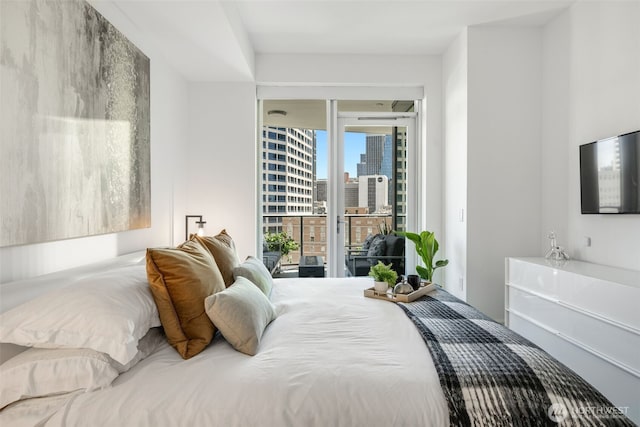 1920 4th Ave Unit 1207, Seattle, WA 98101 - bedroom featuring access to outside