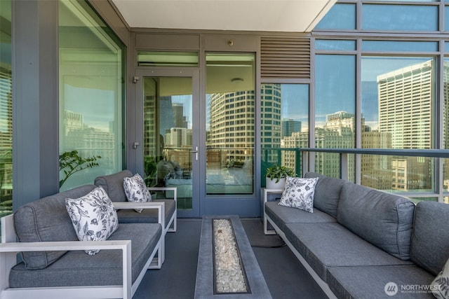1920 4th Ave Unit 1207, Seattle, WA 98101 - balcony with outdoor lounge area and a city view