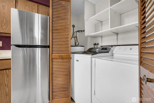 9404 Stone Ave N, Seattle, WA 98103 - laundry area featuring washer and dryer