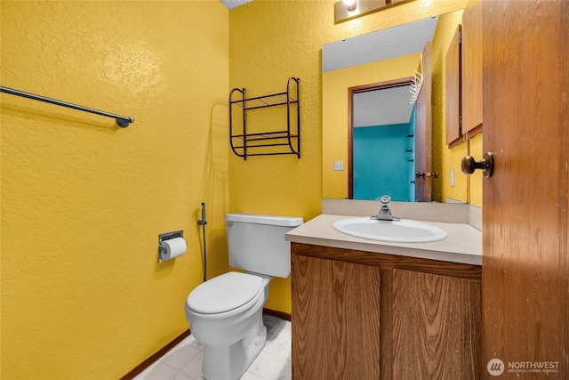 9404 Stone Ave N, Seattle, WA 98103 - bathroom with a textured wall, vanity, and tile patterned floors