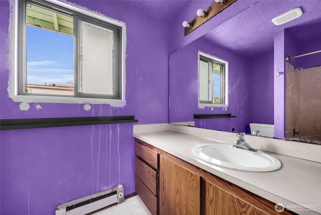 9404 Stone Ave N, Seattle, WA 98103 - full bath featuring a baseboard radiator, vanity, a shower, tile patterned flooring, and a textured ceiling
