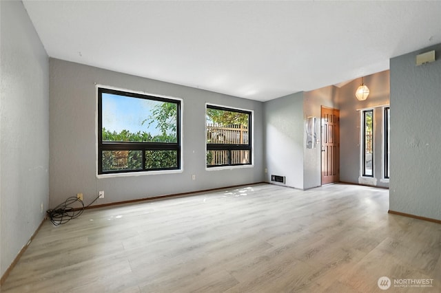 9404 Stone Ave N, Seattle, WA 98103 - empty room featuring wood finished floors