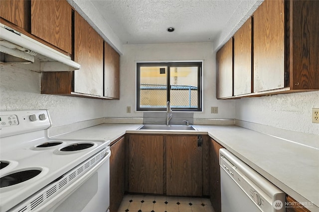 9404 Stone Ave N, Seattle, WA 98103 - kitchen featuring white appliances, ventilation hood, a textured ceiling, light countertops, and light floors
