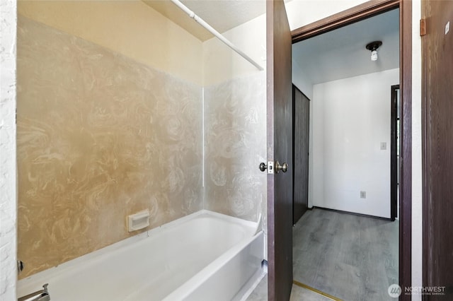9404 Stone Ave N, Seattle, WA 98103 - full bath featuring wood finished floors