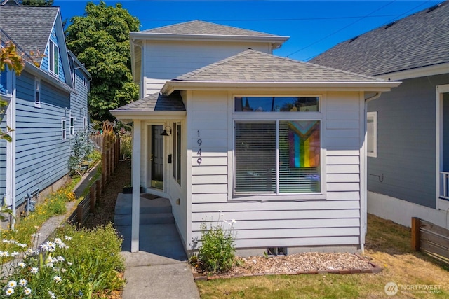 1949 S Sheridan Ave, Tacoma, WA 98405 - doorway to property with roof with shingles