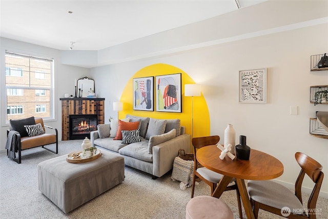 530 4th Ave W Unit 405, Seattle, WA 98119 - living room with light colored carpet and a glass covered fireplace
