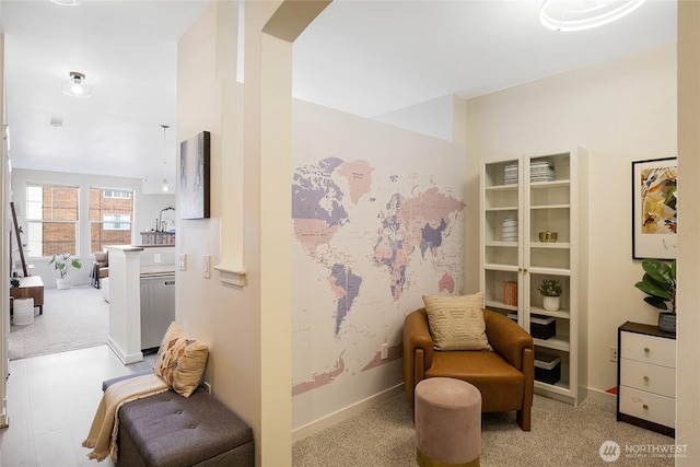 530 4th Ave W Unit 405, Seattle, WA 98119 - living area featuring carpet and baseboards