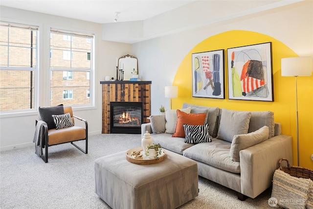 530 4th Ave W Unit 405, Seattle, WA 98119 - living area with light carpet and a glass covered fireplace
