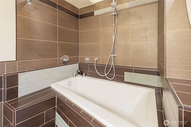 530 4th Ave W Unit 405, Seattle, WA 98119 - bathroom featuring a relaxing tiled tub and a tile shower