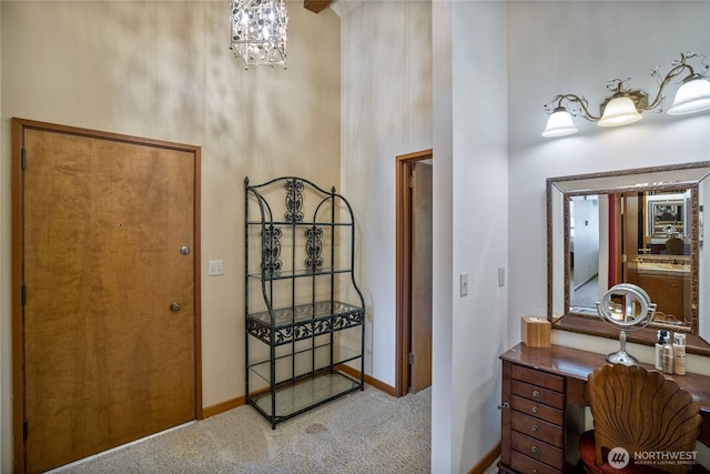 140 Admiralty Ln Unit 370, Port Ludlow, WA 98365 - carpeted entrance foyer with a towering ceiling and baseboards