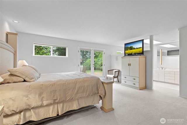 4015 E Broadway St, Mount Vernon, WA 98274 - bedroom featuring access to outside, light colored carpet, connected bathroom, and recessed lighting