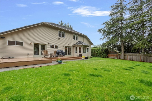 4015 E Broadway St, Mount Vernon, WA 98274 - back of house featuring a fenced backyard, a deck, and french doors