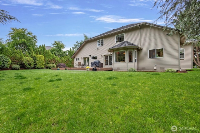 4015 E Broadway St, Mount Vernon, WA 98274 - back of house featuring a lawn and a deck