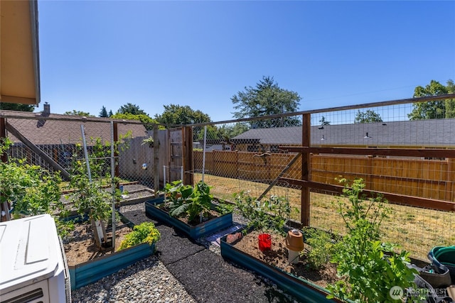 2426 Haines St, Port Townsend, WA 98368 - view of yard featuring a vegetable garden