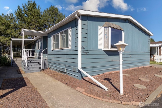 66 Onyx St, Walla Walla, WA 99362 - view of property exterior featuring a porch