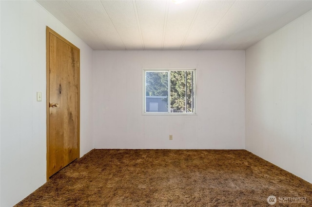 66 Onyx St, Walla Walla, WA 99362 - unfurnished bedroom with carpet flooring and wooden walls