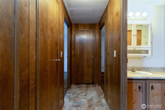 66 Onyx St, Walla Walla, WA 99362 - hallway with stone finish flooring and wood walls