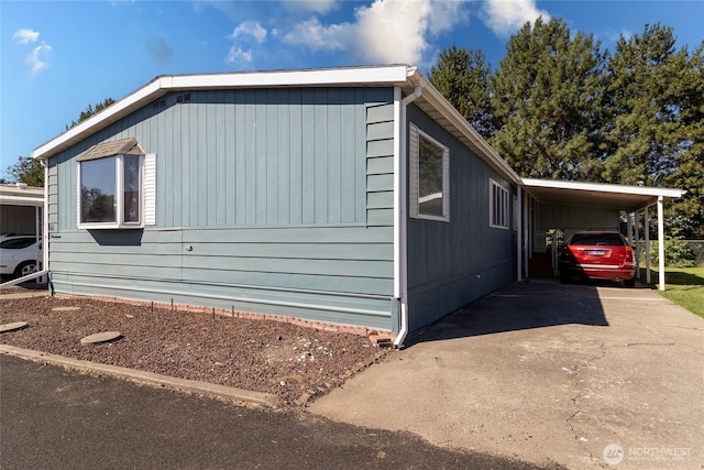 66 Onyx St, Walla Walla, WA 99362 - view of property exterior with concrete driveway and an attached carport
