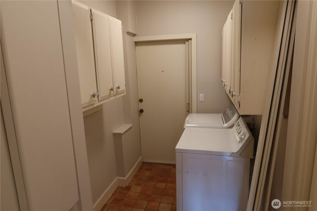 181 N Bay Ln Unit 2, Port Ludlow, WA 98165 - washroom featuring cabinet space and washing machine and clothes dryer