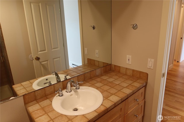 181 N Bay Ln Unit 2, Port Ludlow, WA 98165 - bathroom featuring vanity and wood finished floors