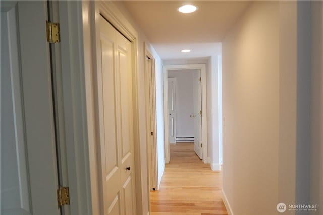 181 N Bay Ln Unit 2, Port Ludlow, WA 98165 - hall featuring a baseboard radiator, light wood-style floors, and recessed lighting