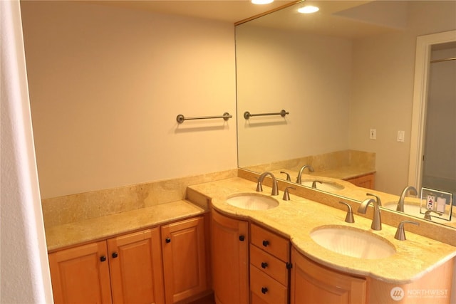 181 N Bay Ln Unit 2, Port Ludlow, WA 98165 - bathroom featuring double vanity and recessed lighting