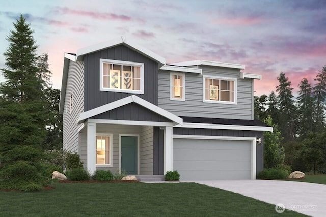 32324 135th Pl SE Unit 211, Sultan, WA 98294 - view of front of house with a garage, concrete driveway, board and batten siding, and a front yard