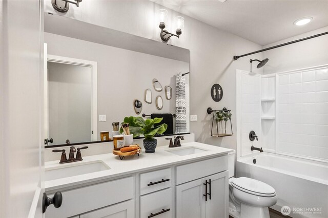 32324 135th Pl SE Unit 211, Sultan, WA 98294 - bathroom featuring double vanity and shower / bath combination with curtain