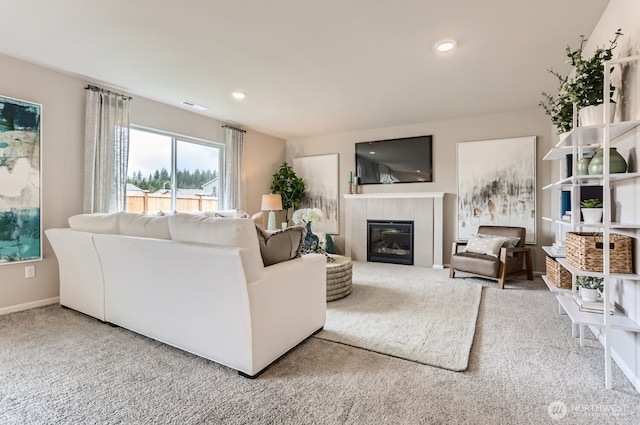 32336 135th Pl SE Unit 213, Sultan, WA 98294 - living area with carpet floors, a tiled fireplace, and recessed lighting