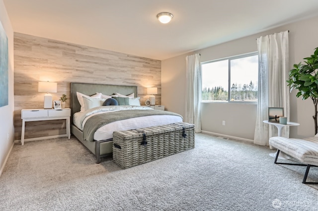 32336 135th Pl SE Unit 213, Sultan, WA 98294 - bedroom with an accent wall, carpet flooring, and wood walls