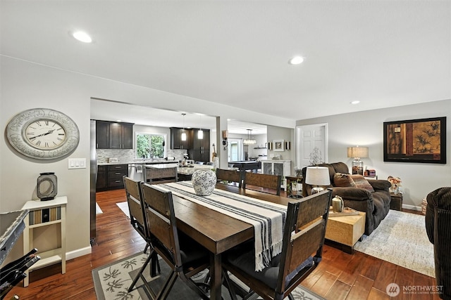 7212 188th Ave E, Bonney Lake, WA 98391 - dining room with dark wood finished floors and recessed lighting