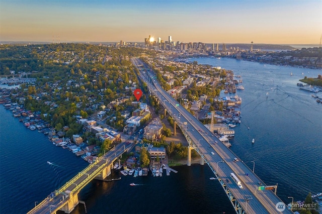3121 Franklin Ave E Unit 24, Seattle, WA 98102 - aerial view at dusk of a notable bridge, a water view, and a view of city