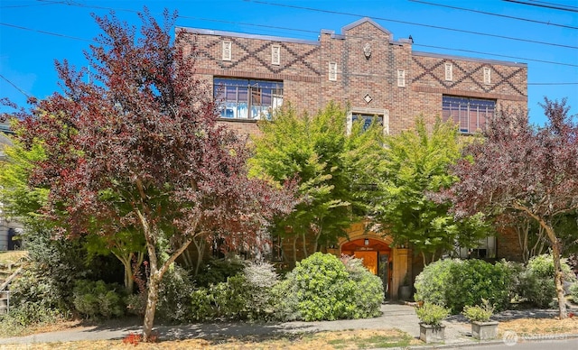 3121 Franklin Ave E Unit 24, Seattle, WA 98102 - view of property hidden behind natural elements with brick siding