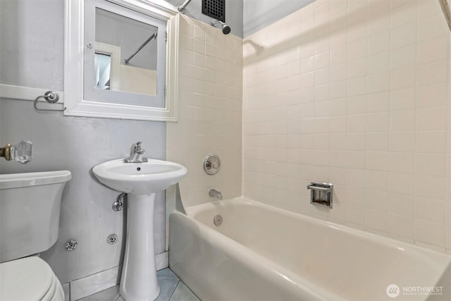 3121 Franklin Ave E Unit 24, Seattle, WA 98102 - bathroom featuring shower / bath combination and tile patterned floors