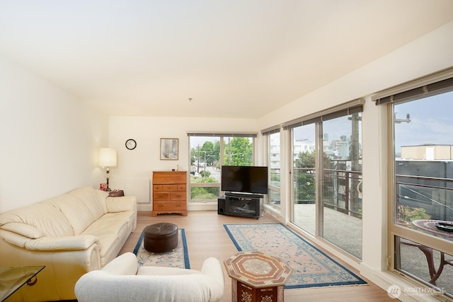 500 5th Ave W Unit 505, Seattle, WA 98119 - living area with wood finished floors