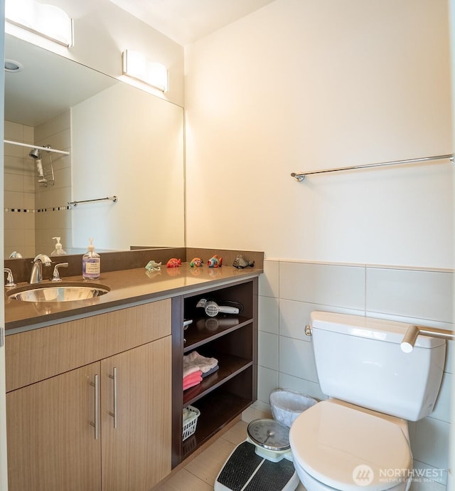 500 5th Ave W Unit 505, Seattle, WA 98119 - bathroom with vanity, a shower, and tile patterned flooring