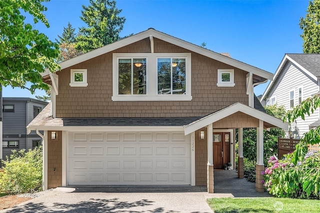 11226 NE 67th St, Kirkland, WA 98033 - view of front of home with an attached garage, driveway, and roof with shingles