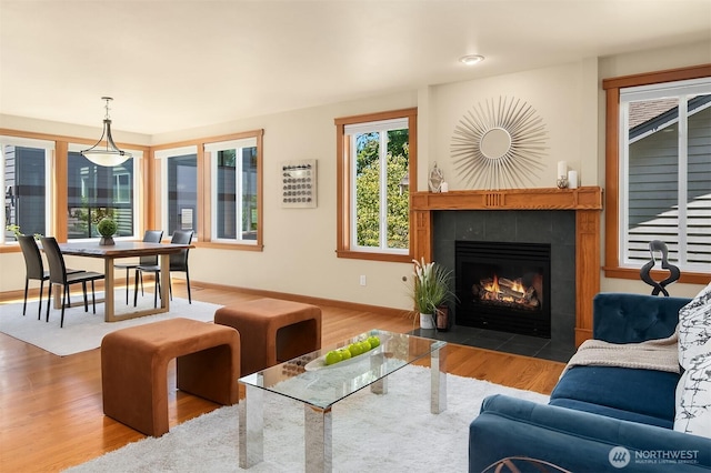 11226 NE 67th St, Kirkland, WA 98033 - living room with wood finished floors and a fireplace