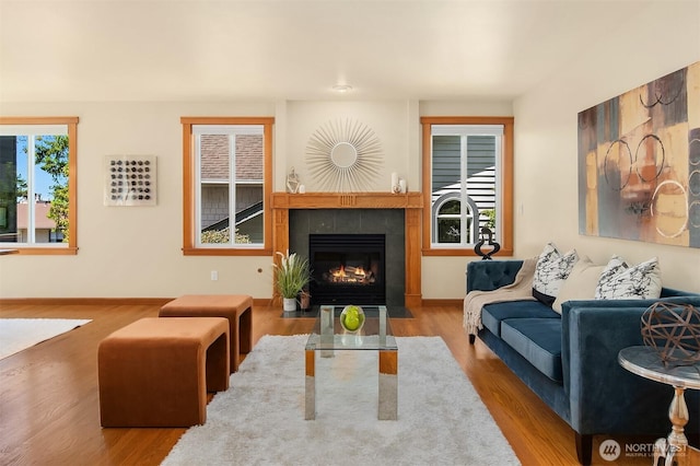 11226 NE 67th St, Kirkland, WA 98033 - living room with wood finished floors and a tiled fireplace