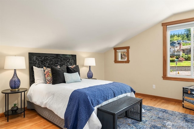 11226 NE 67th St, Kirkland, WA 98033 - bedroom featuring vaulted ceiling and light wood-type flooring