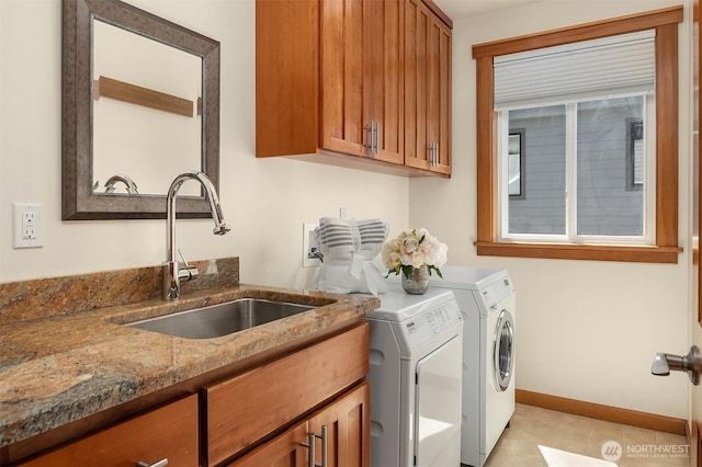 11226 NE 67th St, Kirkland, WA 98033 - laundry area featuring washing machine and dryer, cabinet space, and light tile patterned floors