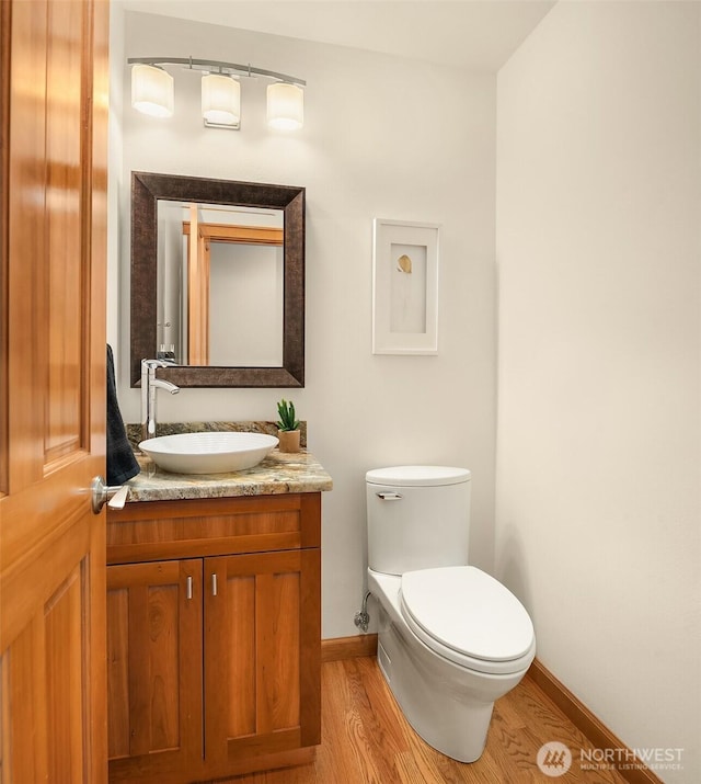 11226 NE 67th St, Kirkland, WA 98033 - bathroom with vanity and wood finished floors