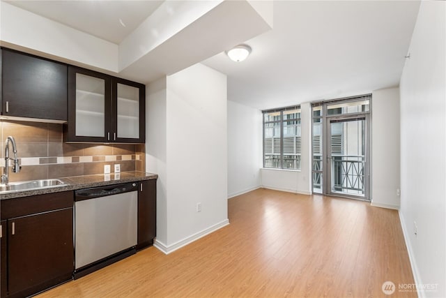 819 Virginia St Unit 2408, Seattle, WA 98101 - kitchen featuring dishwasher, light wood-style flooring, tasteful backsplash, glass insert cabinets, and dark brown cabinetry