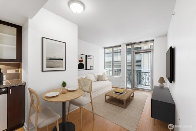 819 Virginia St Unit 2408, Seattle, WA 98101 - living area featuring light wood-style floors and baseboards
