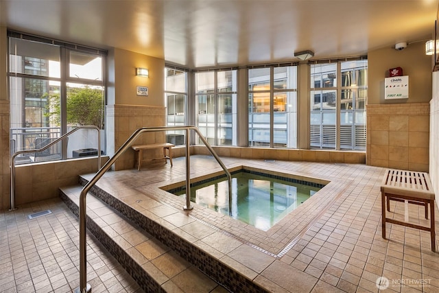 819 Virginia St Unit 2408, Seattle, WA 98101 - view of swimming pool with a hot tub