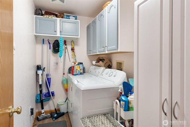 103 Nikula Rd W, Winlock, WA 98596 - laundry room featuring cabinet space and washing machine and clothes dryer